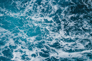 Ocean Water Abstract Texture. Wake Blue and White Fast Moving Waves on Drake Passage. © And They Travel