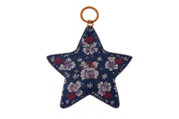 Fabric star ornament featuring blue denim with floral pattern and hanging loop on transparent background