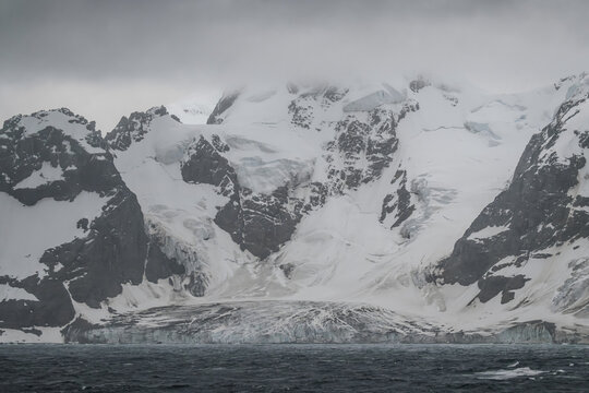 Antarctic Glacier and Snow Covered Mountains in Elephant Island Wide. Frozen Landscape Ice and Ocean Water View From Ship