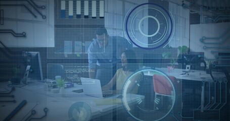 Collaborating colleagues in business shirts pointing at laptop in open office with HUD overlay