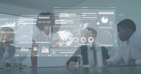 Reviewing four professionals studying holographic display in modern boardroom in business casual