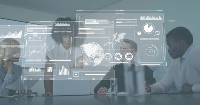 Reviewing four professionals studying holographic display in modern boardroom in business casual - Powered by Adobe