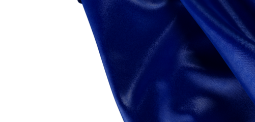 Close-up of royal blue fabric with delicate texture, perfect for backgrounds. The deep blue color evokes luxury and soph