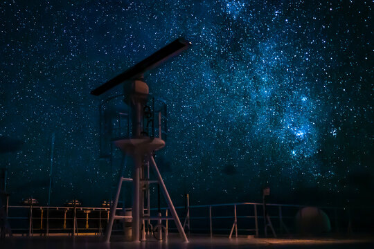 Vesel radar tower under milky way sky