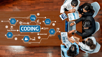 A dynamic business team engages in collaboration over a coding project, surrounded by visual data structure and process elements, fostering creativity and teamwork. Amity