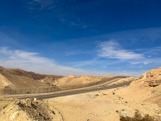 Highway and fence on the border with Egypt in the Eilat Mountains