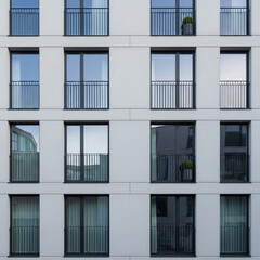 Minimalist Apartment Building Facade with Windows and Repeating Balconies