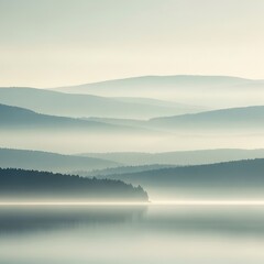 Fototapeta premium Foggy Morning Mist Over Layered Mountain Ranges Reflected on Calm Lake Surface with Soft Pastel Tones and Serene Atmosphere