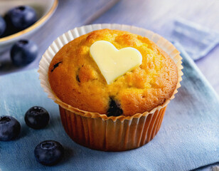 Heart Shaped Butter Pat on a Blueberry Muffin AI