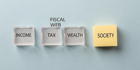 Conceptual Blocks Representing Fiscal Elements with Income, Tax, Wealth Terms on Blue Background for Finance Themes