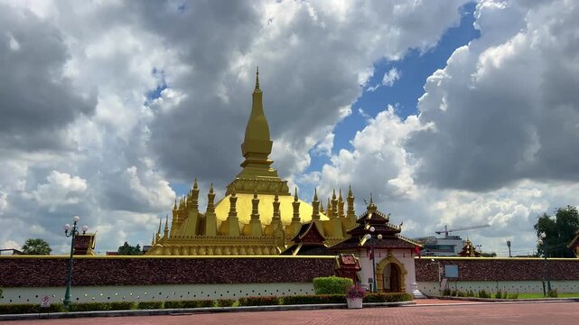 Pha That Luang Stupa is a famous landmark in Vientiane, Laos. Asia. Golden Stupa. Buddhist religious structure. Residence of the Lao Buddhist Patriarch. 4K