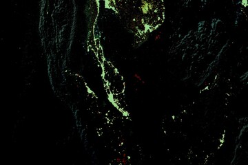 Obraz premium Silhouette of a zone of the globe. Aerial and top view illustration of the ground in green and black. Abstract background for pattern, paper, wallpaper or fabric. Map zone and earth.