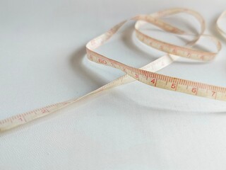 tailor measuring tape on white background