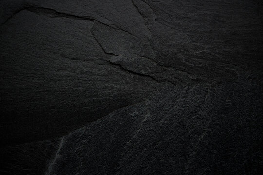Dark grey black slate background or texture