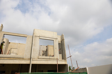 Prefabricated concrete walls for building office buildings and residential houses. Precast reinforced concrete wall panel for construction building.