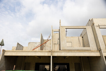 Prefabricated concrete walls for building office buildings and residential houses. Precast reinforced concrete wall panel for construction building.