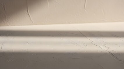 A cracked white surface with a shadow cast over a horizontal molding edge via RJ Whisk Auto image