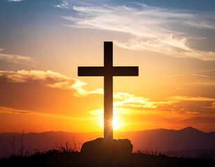 Silhouette of a wooden cross against a vibrant sunset sky