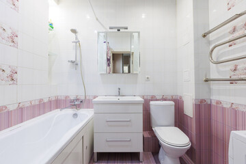 modern bathroom room with toilet and washing machine