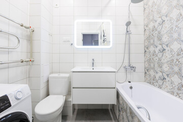 modern bathroom room with toilet and washing machine