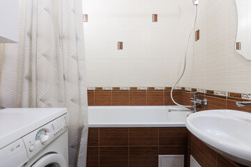 modern bathroom room with toilet and washing machine