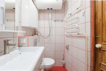 modern bathroom room with toilet and washing machine