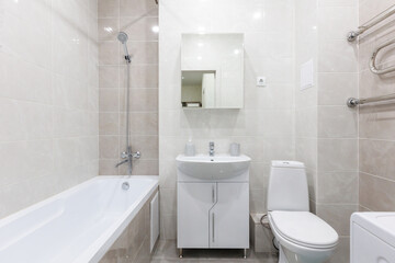 modern bathroom room with toilet and washing machine