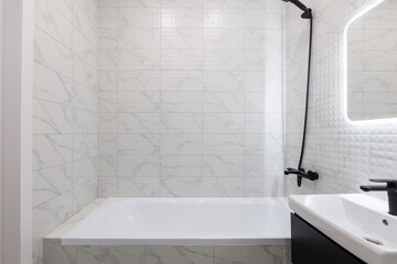 modern bathroom room with toilet and washing machine