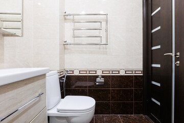modern bathroom room with toilet and washing machine