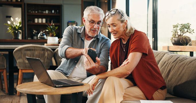 House, talking and old couple with smartphone, laptop and mortgage with pension fund. Budget, man or woman with discussion, cellphone or digital app for banking statement, savings or asset management - Powered by Adobe