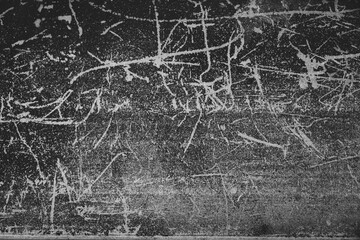 Weathered steel surface background with peeling paint scratches.