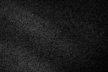 Road surface showing asphalt textures for background.