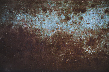 Textured steel rust surface background with peeling finish scratches.