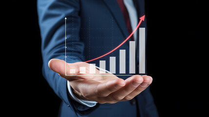 Businessman holding hand with rising bar graph and upward arrow overlay growth success