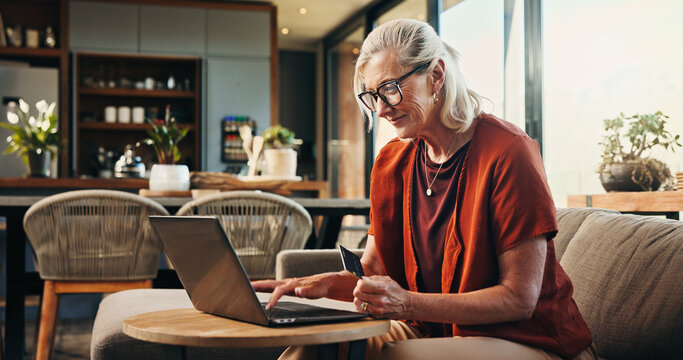 Senior, happy woman or laptop with credit card in home for online shopping or purchase. Elderly, female person or shopper with computer or debit for ecommerce, virtual transaction or banking in house