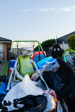 pile of junk and household rubbish on the kerbside for pickup during annual council clean up