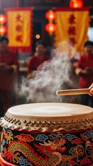 Traditional Chinese dragon drum being played with a stick, creating a cloud of steam during a festive cultural celebration