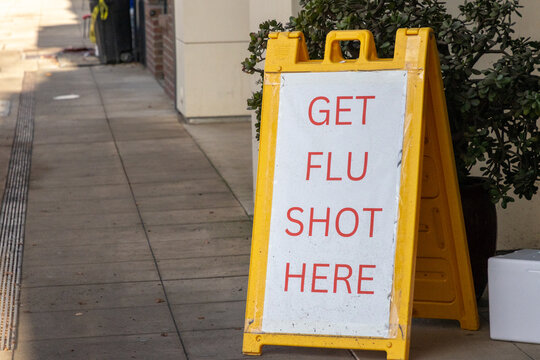 A sign advertising flu shot