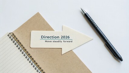 Direction 2026 Arrow Sign on Notepad with Pen for Future Planning and Goal Setting