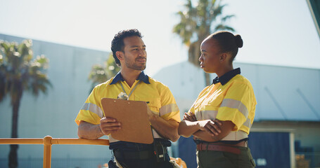 Supply chain, coworkers outdoor and discussion with clipboard for quality control, dispatch or...
