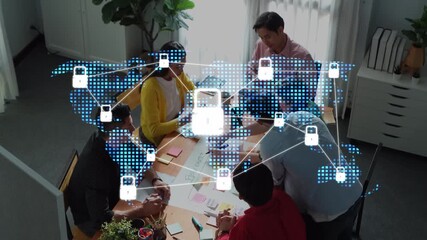 A diverse business team collaborates in a modern office, focusing on strategies while digital security symbols emphasize the importance of data protection and cybersecurity awareness. Raster - Powered by Adobe