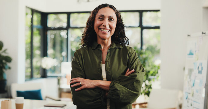 Business woman, portrait and confidence in home office for research, remote work and about us. Mature virtual assistant, freelancer and arms crossed for project management, pride or admin support