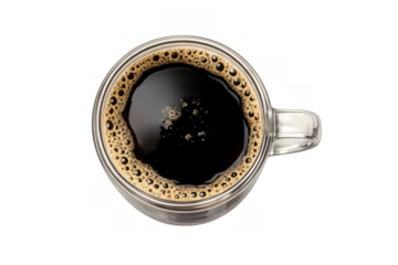Black coffee in clear glass mug with crema, overhead view illustrating morning energy and caffeine beverage
