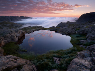 Mountain Tarn Reflecting Pink Sky and Clouds at Sunrise Serene Landscape