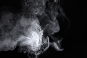 Soft curling vapor overlay on deep black, gentle wisps of white smoke rising and twisting, dreamy fog texture for photo manipulations, banners, album covers and cinematic art

