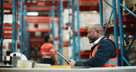 Supply chain, tablet and man in warehouse, internet and digital app for shipping schedule. Mature...