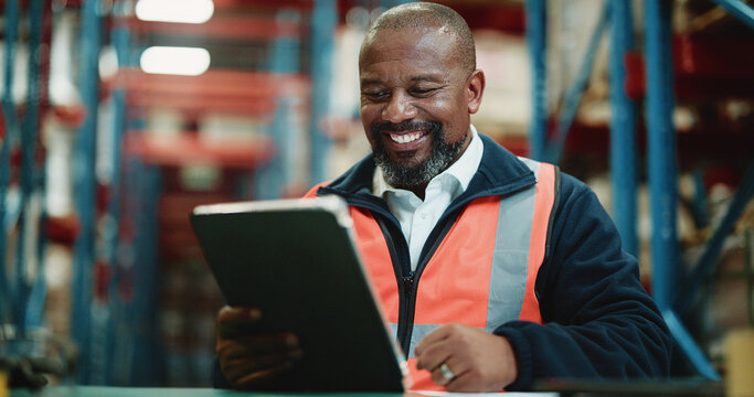 Logistics, warehouse and man with tablet, happy and inventory for supply chain, online and shipping. Factory, mature operations manager and black person with tech for distribution and production
