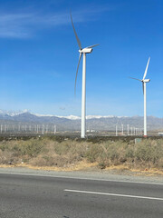 Wind Turbines In Desert Landscape