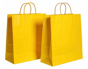 Two bright yellow shopping bags with brown handles on a white background