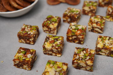 Anjeer Pak is a rich and wholesome Indian sweet made primarily from dried figs (anjeer) blended with premium dry fruits and aromatic spices. Naturally sweet with a dense, soft, and slightly chewy text